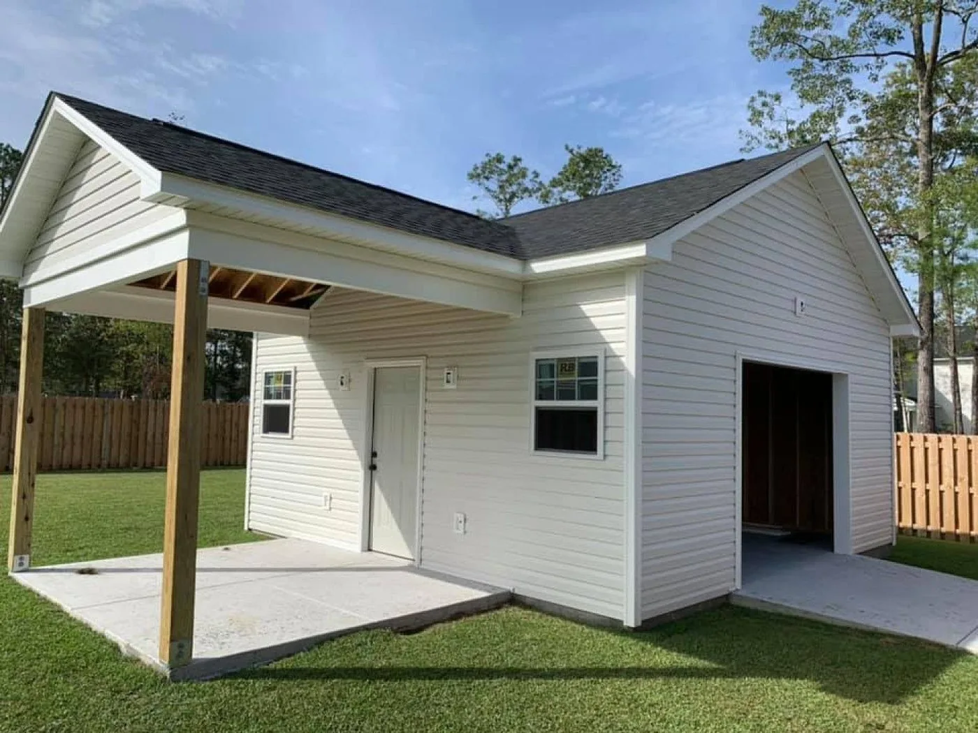 Home addition with a covered breezeway and new garage